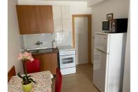 Kuchyňa alebo kuchynka v ubytovaní Apartment Nuka - One Bedroom Apartment with Terrace