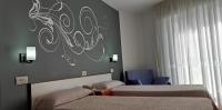 Postel nebo postele na pokoji v ubytování Hotel Grove