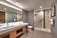a bathroom with a toilet and a sink and a shower at Hyatt Place Boise/Downtown in Boise