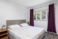Postel nebo postele na pokoji v ubytování Gabriel Apartment Dubrovnik