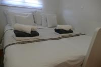 Posteľ alebo postele v izbe v ubytovaní Seafront City Apartment Ana Trogir