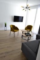 Televízia a/alebo spoločenská miestnosť v ubytovaní Villa Apartment Joel