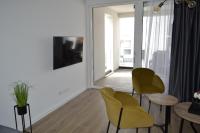 Televízia a/alebo spoločenská miestnosť v ubytovaní Villa Apartment Joel