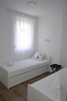 Posteľ alebo postele v izbe v ubytovaní Villa Apartment Joel