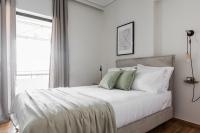 Posteľ alebo postele v izbe v ubytovaní Signature 2BR Apartment in Marousi by UPSTREET