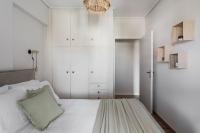 Posteľ alebo postele v izbe v ubytovaní Signature 2BR Apartment in Marousi by UPSTREET