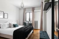 Posteľ alebo postele v izbe v ubytovaní Signature 2BR Apartment in Marousi by UPSTREET