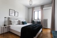 Posteľ alebo postele v izbe v ubytovaní Signature 2BR Apartment in Marousi by UPSTREET
