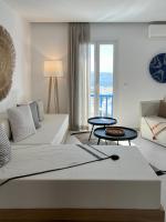 Łóżko lub łóżka w pokoju w obiekcie Portobello Boutique Hotel