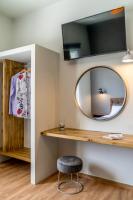 Telewizja i/lub zestaw kina domowego w obiekcie Amarie House with Sea View & Sunset View