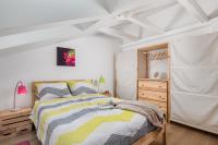 Posteľ alebo postele v izbe v ubytovaní Apartment Palach
