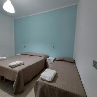 A bed or beds in a room at Hotel Villa Alberta B&B