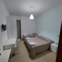 A bed or beds in a room at Hotel Villa Alberta B&B