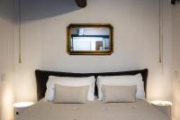 A bed or beds in a room at Pantheon by Agrippa Suite