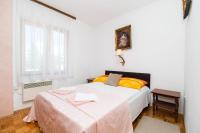 Postel nebo postele na pokoji v ubytování Apartment Mirjam