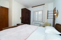 Postel nebo postele na pokoji v ubytování Apartment Mirjam