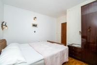 Postel nebo postele na pokoji v ubytování Apartment Mirjam