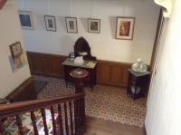 a room with a staircase and a stair case at La Maison de la Riviere B&amp;B in Espéraza