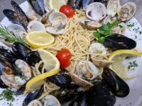 a plate of pasta with mussels and seafood at Restaurant &amp; rooms Visovac - best value in Skradin
