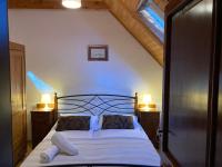 Posteľ alebo postele v izbe v ubytovaní Apartmani Belvedere
