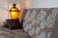 Posteľ alebo postele v izbe v ubytovaní Apartmani Belvedere