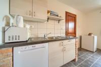 Kuchyňa alebo kuchynka v ubytovaní Apartmani Belvedere