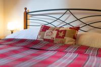 Posteľ alebo postele v izbe v ubytovaní Apartmani Belvedere