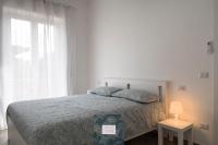 Posteľ alebo postele v izbe v ubytovaní La casa di Elia e Italo