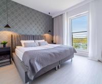 Łóżko lub łóżka w pokoju w obiekcie Bella Vista - 3pok, 5 łóżek, centrum, parking, winda, widok na rzekę, Netflix