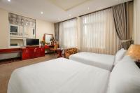 A25 Hotel - 705 Lac Long Quanにあるベッド