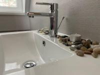 Kúpeľňa v ubytovaní Apartmán Zelený dom 43