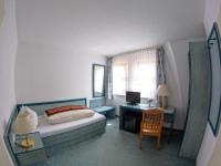 Postel nebo postele na pokoji v ubytování Hotel Diana