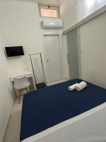 Łóżko lub łóżka w pokoju w obiekcie B&B Regina Rooms