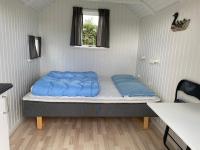 Postel nebo postele na pokoji v ubytování Asaa Camping & Cottages