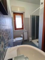 A bathroom at B&B CasaBuddace