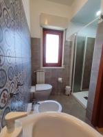 A bathroom at B&B CasaBuddace
