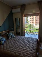 A bed or beds in a room at B&B CasaBuddace