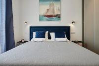 Posteľ alebo postele v izbe v ubytovaní Royal blue House