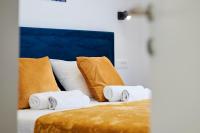 Posteľ alebo postele v izbe v ubytovaní Royal blue House