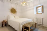 Postel nebo postele na pokoji v ubytování Casa Santiago House Boutique