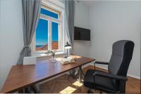 Televízia a/alebo spoločenská miestnosť v ubytovaní Apartment Summer Wind
