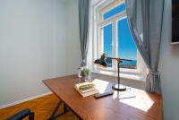 Televízia a/alebo spoločenská miestnosť v ubytovaní Apartment Summer Wind