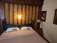 A bed or beds in a room at House Rodia