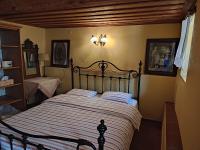 A bed or beds in a room at House Rodia