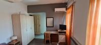 Televízia a/alebo spoločenská miestnosť v ubytovaní Rooms Lara