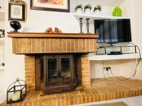 Telewizja i/lub zestaw kina domowego w obiekcie *****Villa de Món max. 8 Personen, Meerblick + Pool