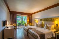 Voodi või voodid majutusasutuse Best Western Premier Bangtao Beach Resort & Spa toas