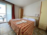 Posteľ alebo postele v izbe v ubytovaní Hotel Nanni Garnì