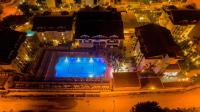 Bazén v ubytování Aes Club Hotel nebo v jeho okolí