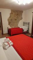 Łóżko lub łóżka w pokoju w obiekcie Agriturismo Il Casone